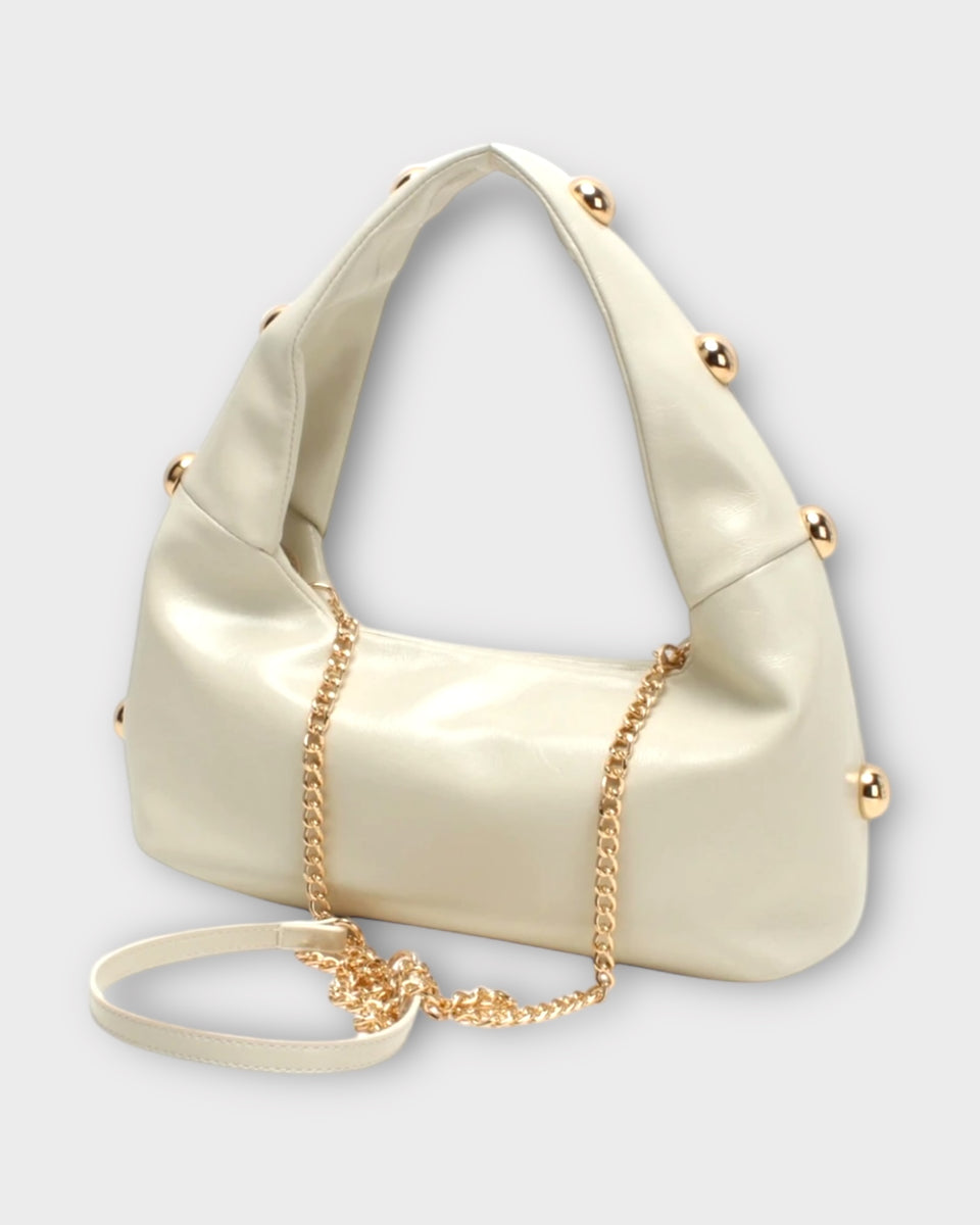Sac à main chic couleur crème avec dorure