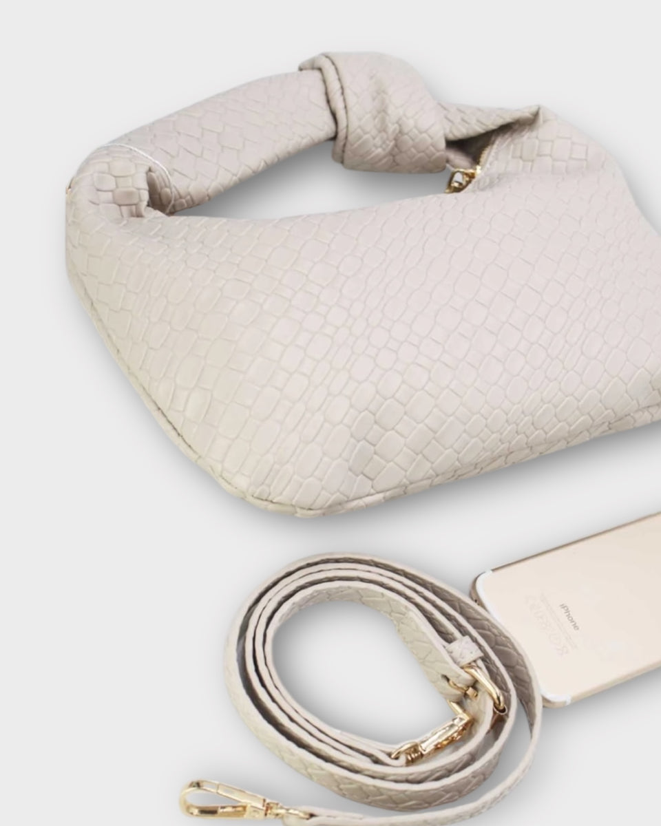 Sac à main demi-lune tissé