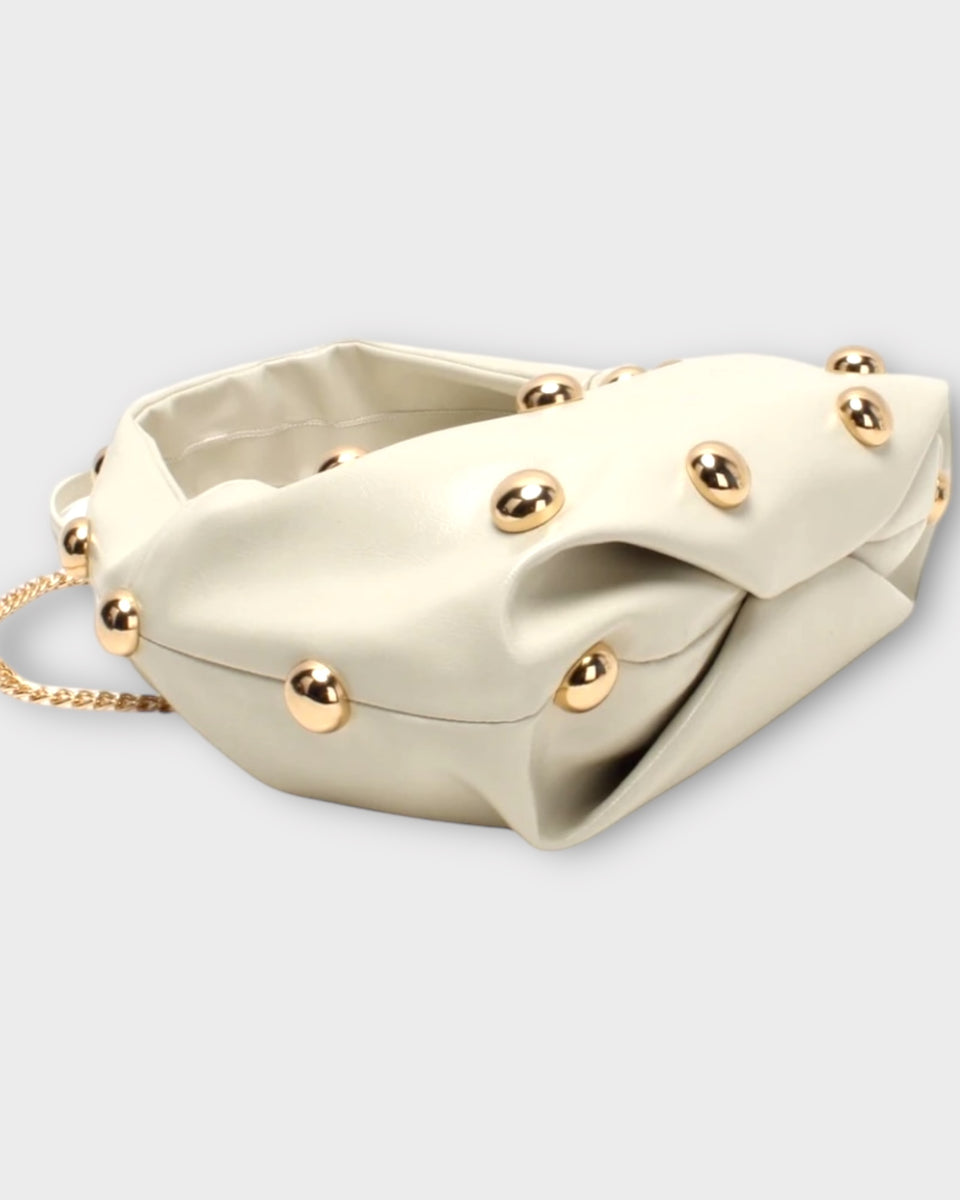 Sac à main chic couleur crème avec dorure